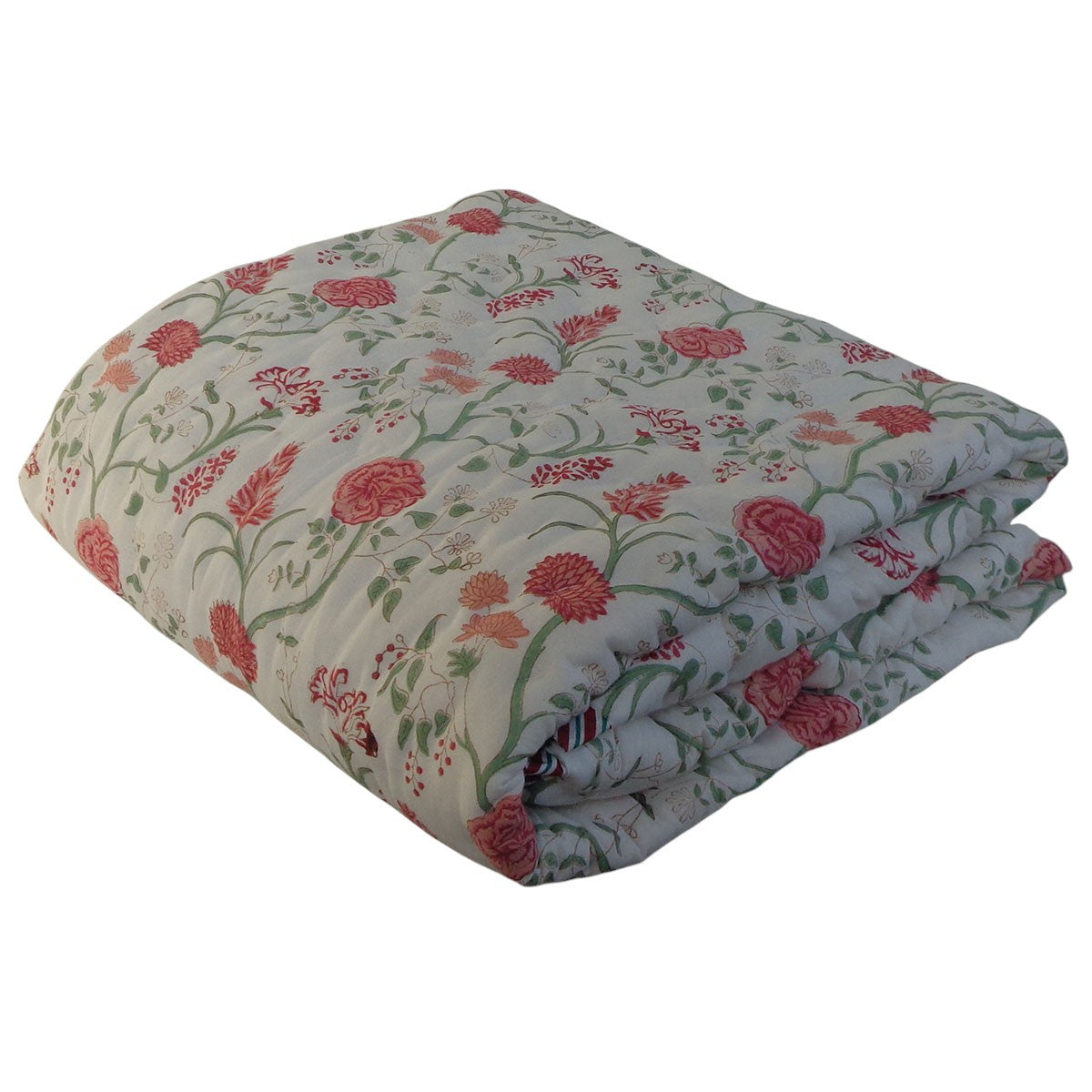 A folded quilted comforter with a floral pattern featuring pink roses and green vines on a light beige background, isolated on a white background.