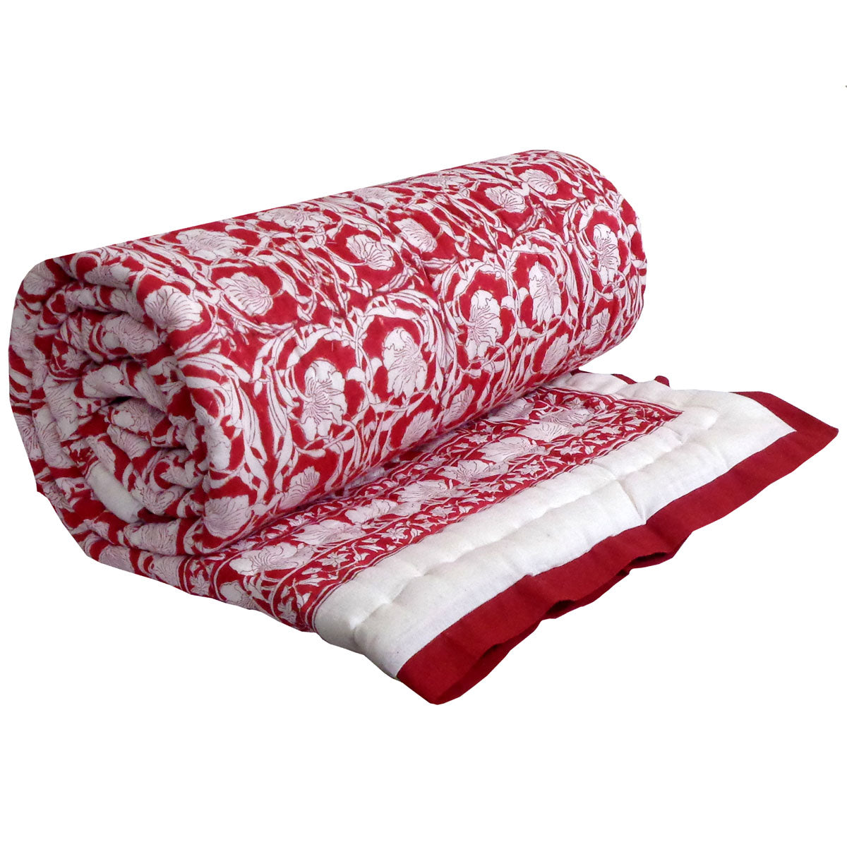 A rolled-up quilted blanket featuring a red and white floral pattern, with a solid red border and white quilted backing, displayed on a clean white background.