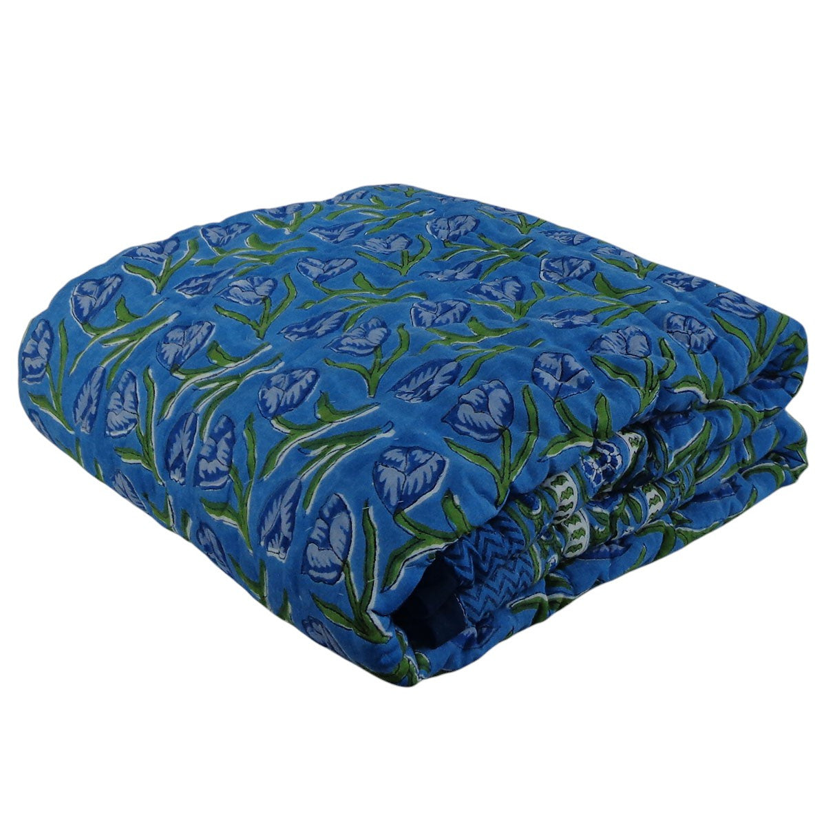 A folded quilted blanket featuring a blue floral pattern with green stems, set against a plain white background.