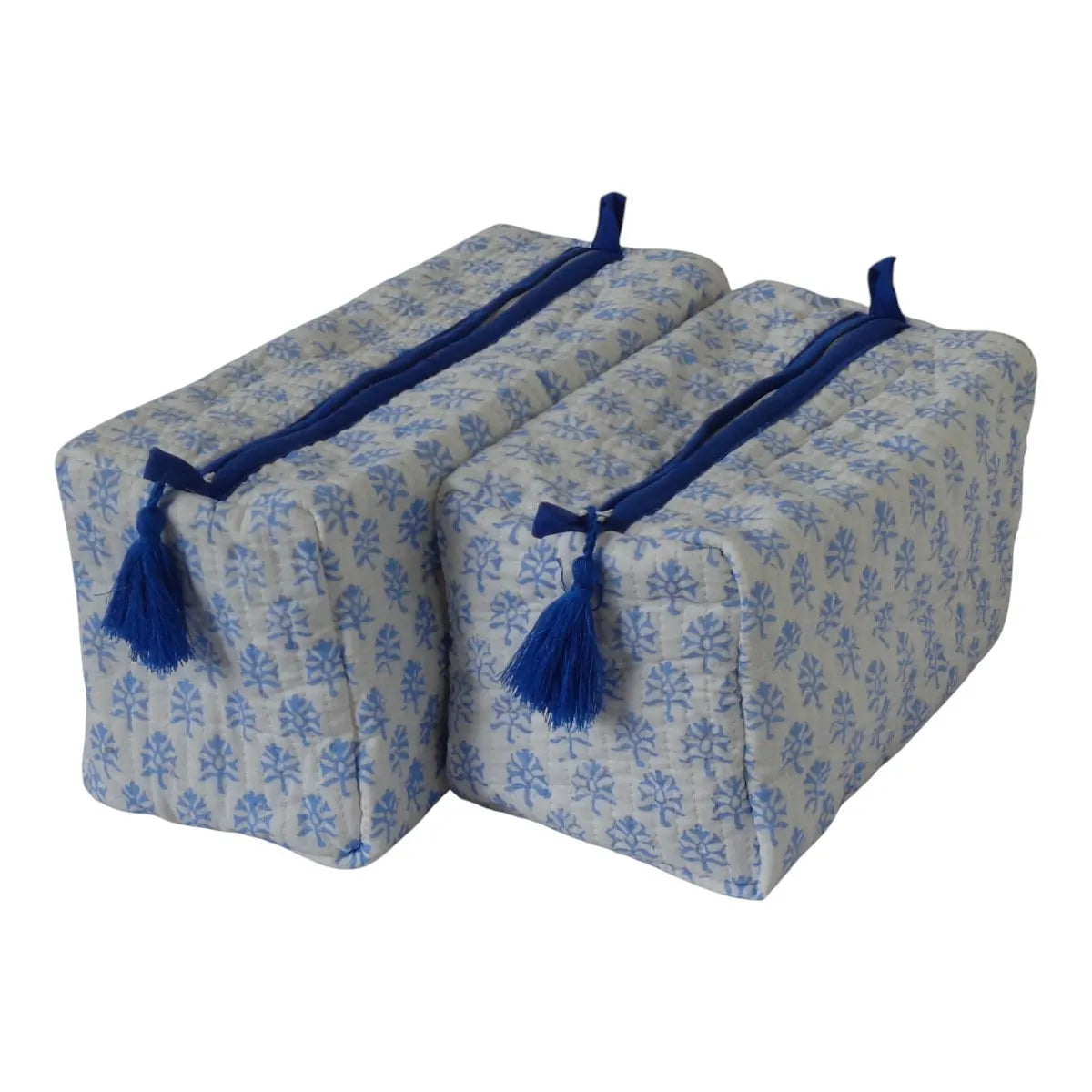 Two rectangular zippered storage bags with a blue floral pattern on a light gray background, featuring dark blue tassels on the zipper pulls, shown against a plain white background.