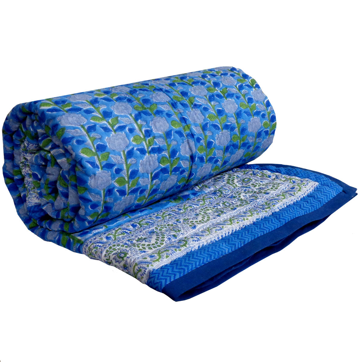 A rolled-up blue quilted blanket with a floral pattern and a matching folded side showing a paisley border, set against a plain white background.
