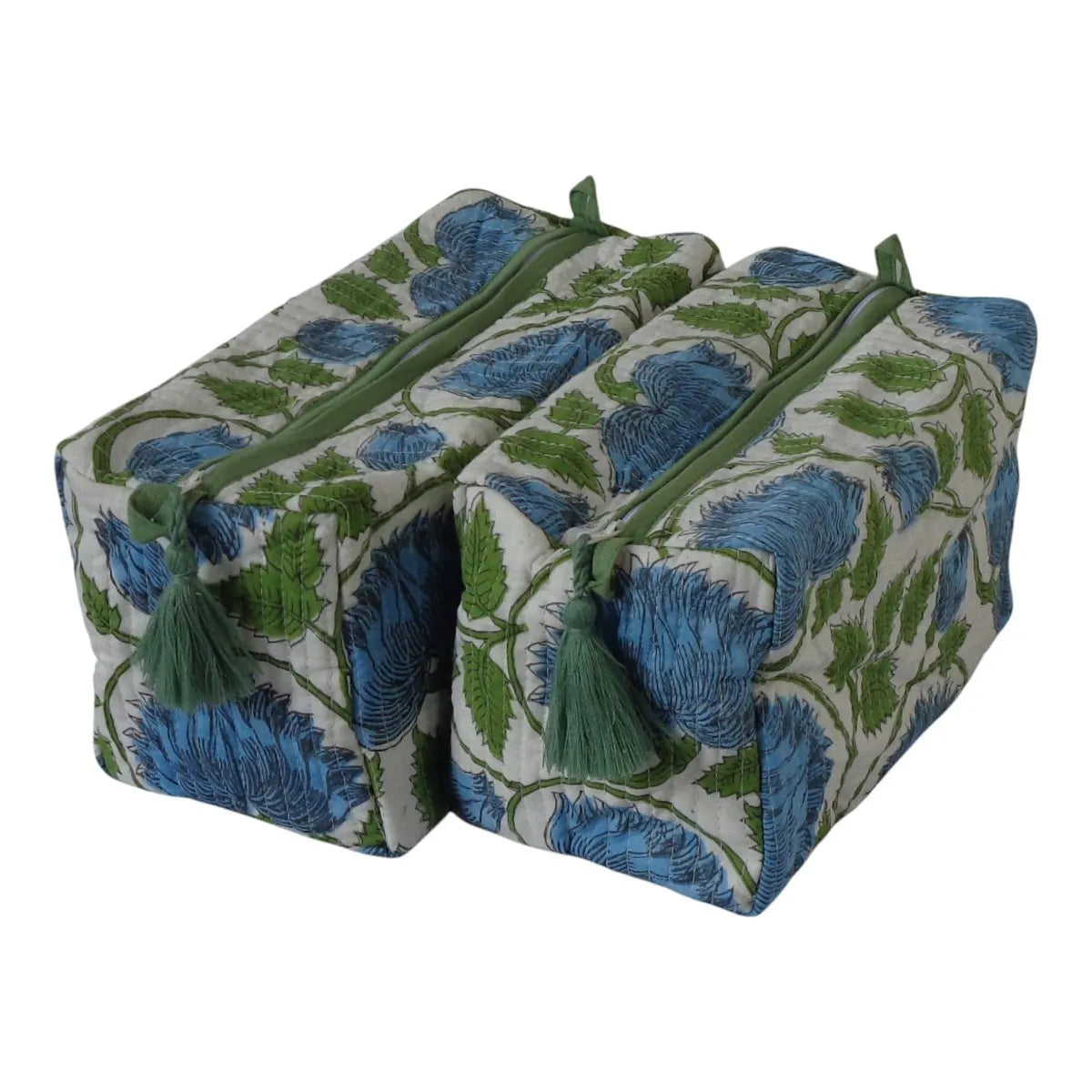 Two rectangular zippered pouches with a blue and green floral pattern on a cream background, featuring green tassels on the zipper pulls, set against a plain white background.