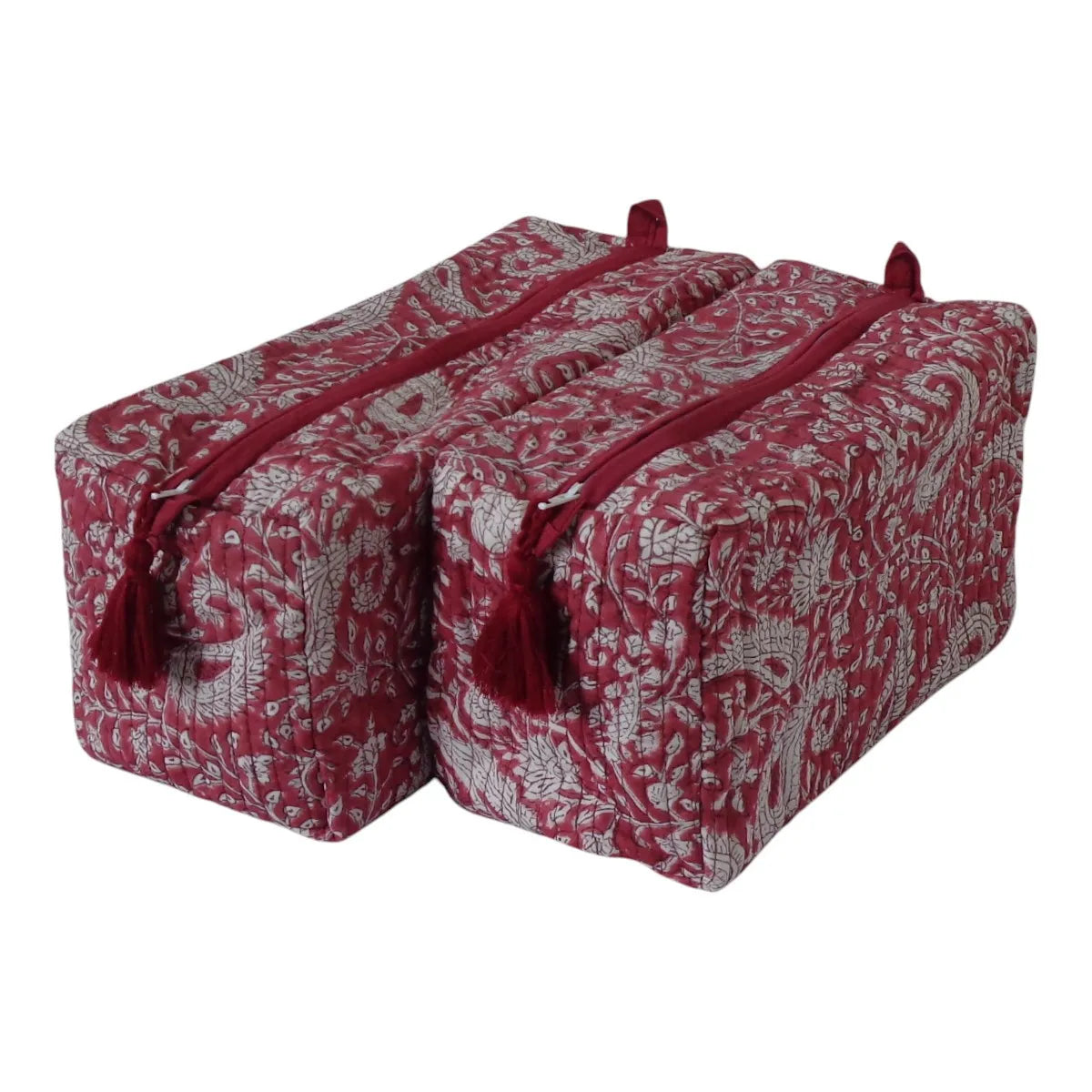 Two rectangular zippered storage bags with tassel pulls, featuring a red and white floral block print pattern, shown on a plain white background.