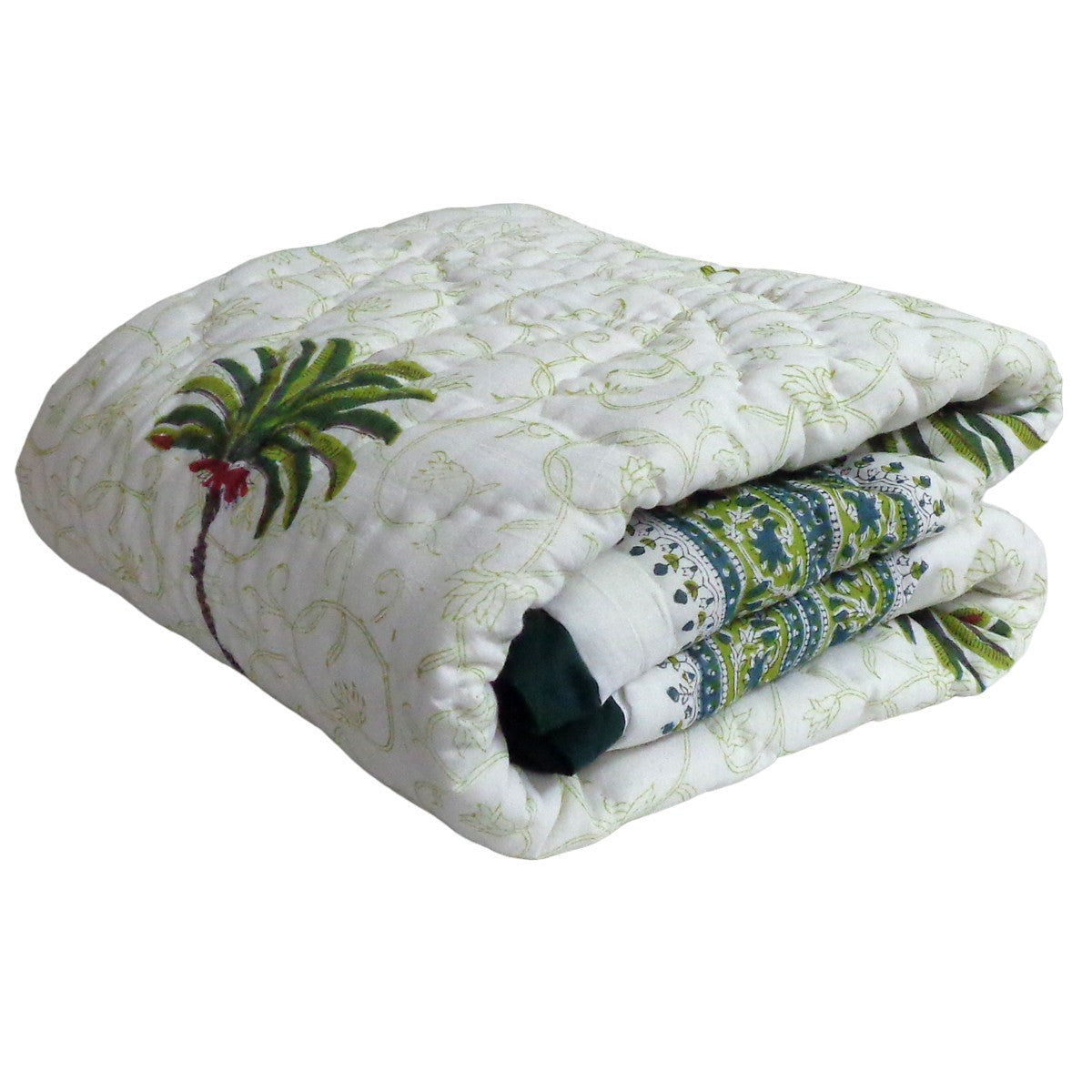 A folded quilted comforter or blanket with a white background, light green vine pattern, and a green palm tree design on the front, shown on a plain white background.