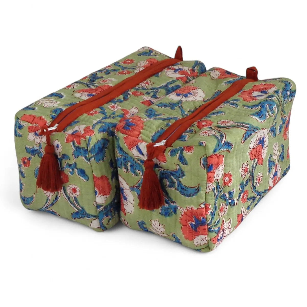 Two square zippered fabric storage bags with a green floral print and red tassels, shown on a white background.