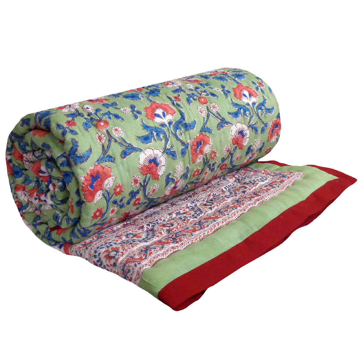 A rolled-out quilted blanket featuring a light green background with a red, blue, and white floral pattern, finished with a solid red border.