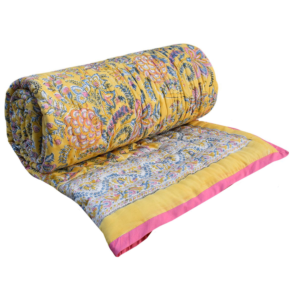 A rolled and laid-flat quilted blanket with a vibrant yellow base, intricate multicolor floral and paisley patterns, and a contrasting pink border, shown on a plain white background.