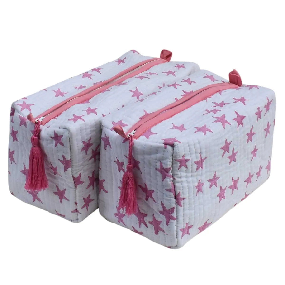 Two quilted fabric zippered storage bags with pink star patterns and pink tassels, shown on a plain white background.